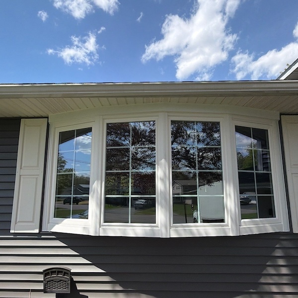 New bay window with white moulding installed by Patriot Homes